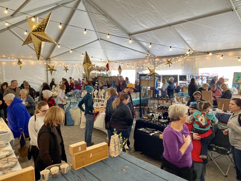 Hundreds of shoppers flock to Dewey Beach Sip and Shop to purchase unique artwork and enjoy a brew or two. ELLEN DRISCOLL PHOTOS